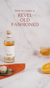 Old fashioned cocktail recipe with Revel Eau De Vie Spirit bottle by Feels Botanical, with lively fruit, spice & smooth chocolate notes